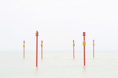 Lifeguard hut on beach against clear sky