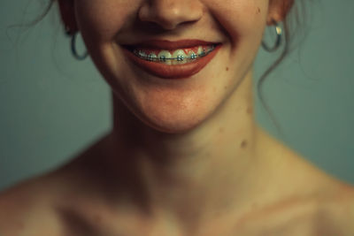 Close-up portrait of a smiling young woman