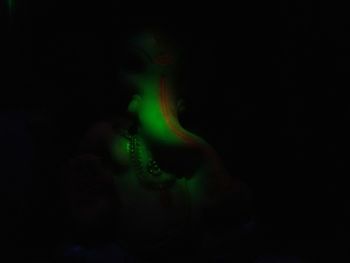 Close-up of light painting over black background