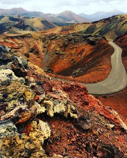 Aerial view of landscape and mountains against sky