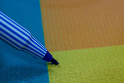 High angle view of colored pencils on table