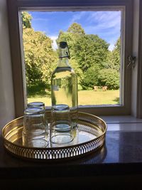 Close-up of glass window on table