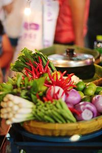 Close-up of hand with vegetables