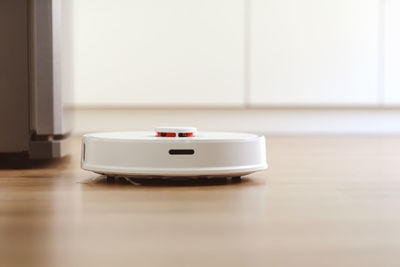 Close-up of mobile phone on table