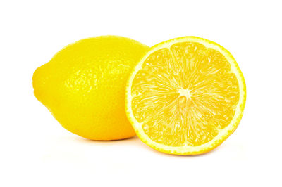 Close-up of lemon slice against white background