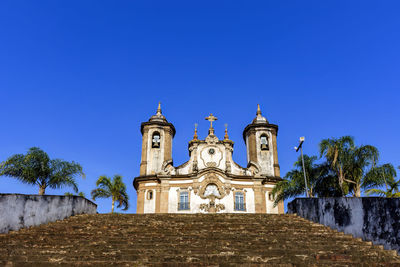 Staircase and facade of a historic baroque church in the city of ouro preto in minas gerais