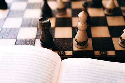 High angle view of chess pieces on table