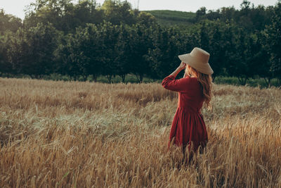 Woman standing on field