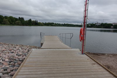 View of pier over calm lake