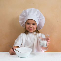 Portrait of young woman having food
