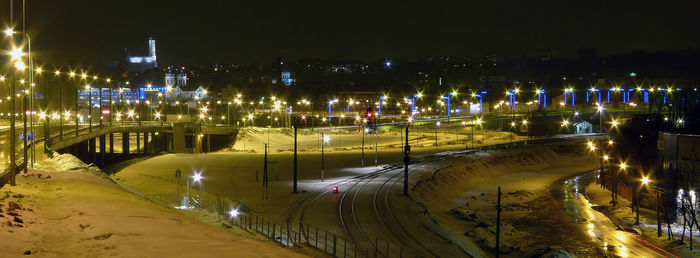 High angle view of illuminated cityscape at night