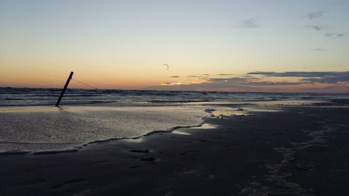 Scenic view of sea at sunset