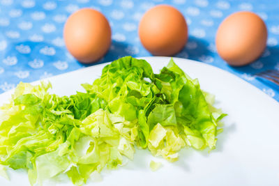 Close-up of vegetables in plate on table