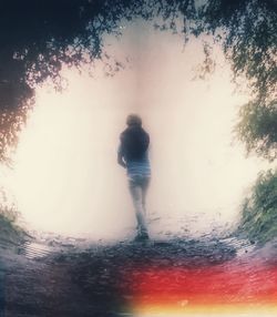 Woman standing in water