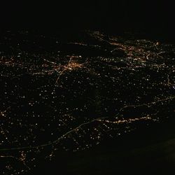 Aerial view of illuminated cityscape