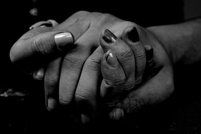 Close-up of people holding hands