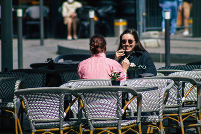 People sitting on chair at restaurant