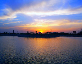 Scenic view of sea at sunset