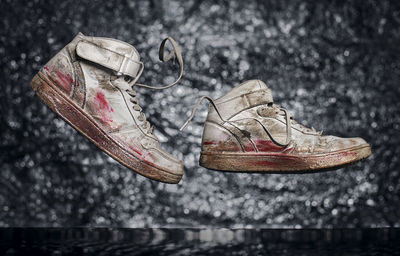 Close-up of abandoned shoes