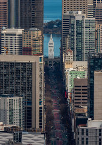 Modern buildings in city against sky