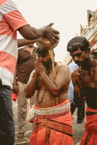 Men and people in water