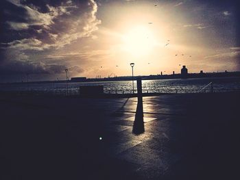Scenic view of sunset over river