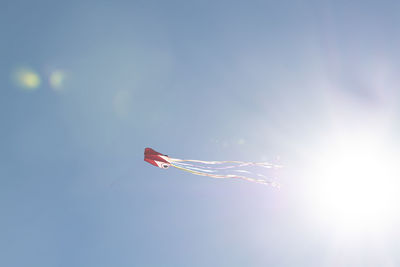 Low angle view of flag against sky