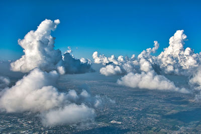 Panoramic view of clouds over blue sky