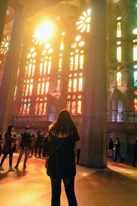 People in illuminated room
