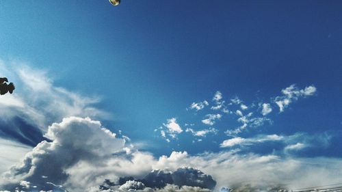 Low angle view of clouds in blue sky