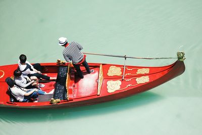 People on boat sailing in sea