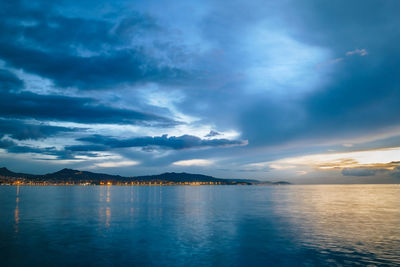 Scenic view of sea against dramatic sky