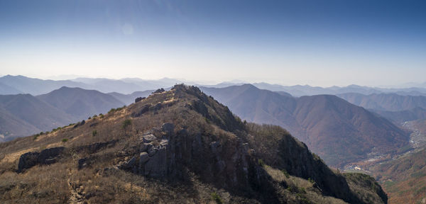 Scenic view of mountains against clear sky