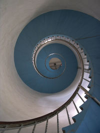 Directly below shot of spiral staircase in building