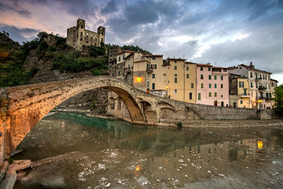 Bridge over river against sky