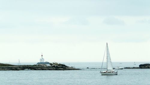 Sailboat sailing on sea
