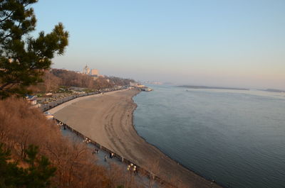 High angle view of beach against sky during sunset