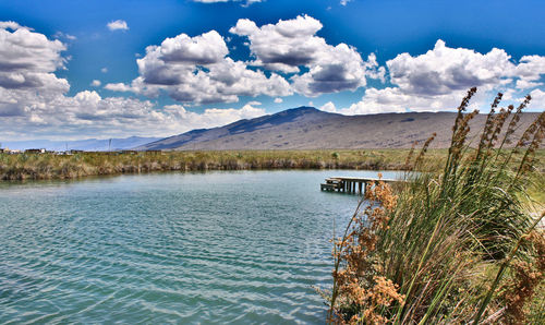 Scenic view of river against sky