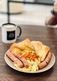 Close-up of breakfast served on table