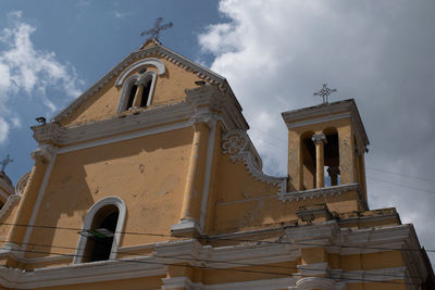 Low angle view of traditional building against sky