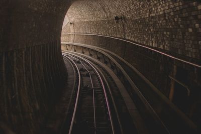 Railroad tracks in tunnel
