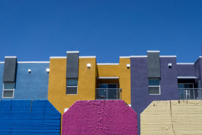 Low angle view of built structure against blue sky