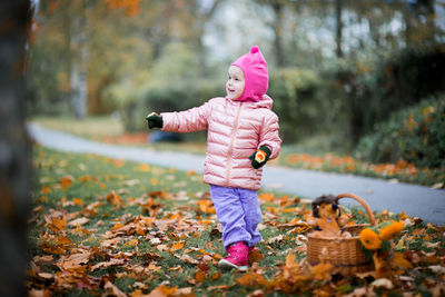 Close-up of cute girl in park during autumn