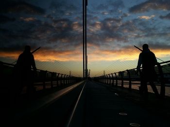 Silhouette of tree against dramatic sky