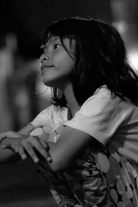 Close-up of thoughtful girl looking away