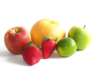 Close-up of apple on white background