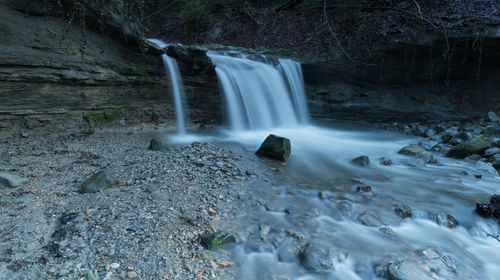 Scenic view of waterfall in forest