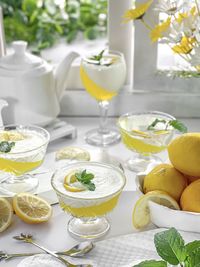 Fruits in glass on table