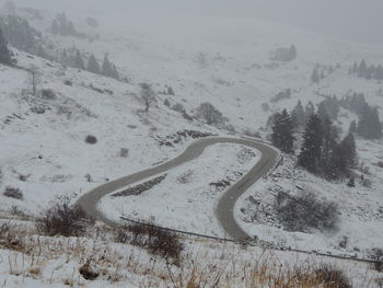 Aerial view of mountain road during winter