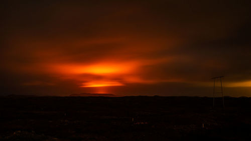 Scenic view of dramatic sky during sunset